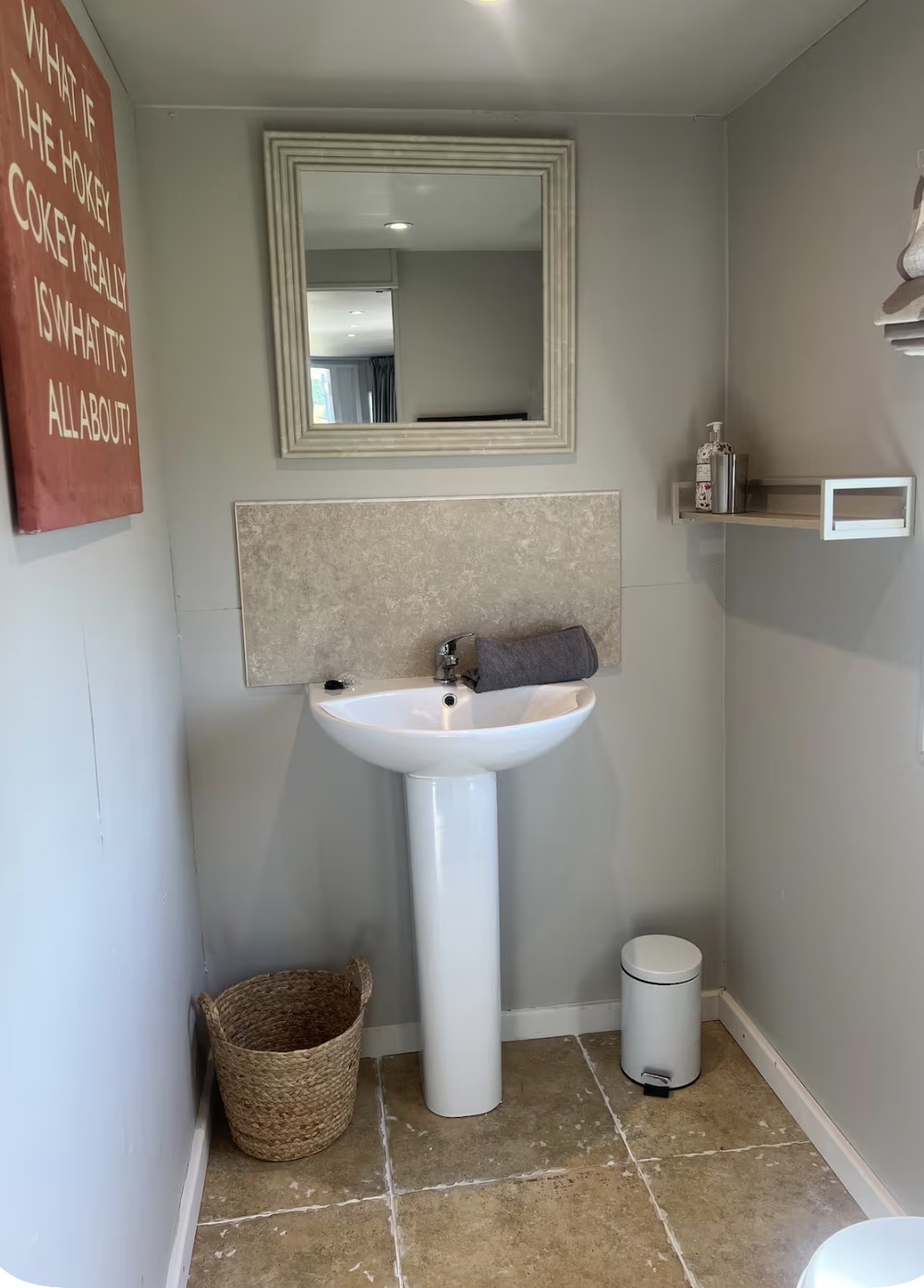 Bathroom with soft grey painted walls and white trim
